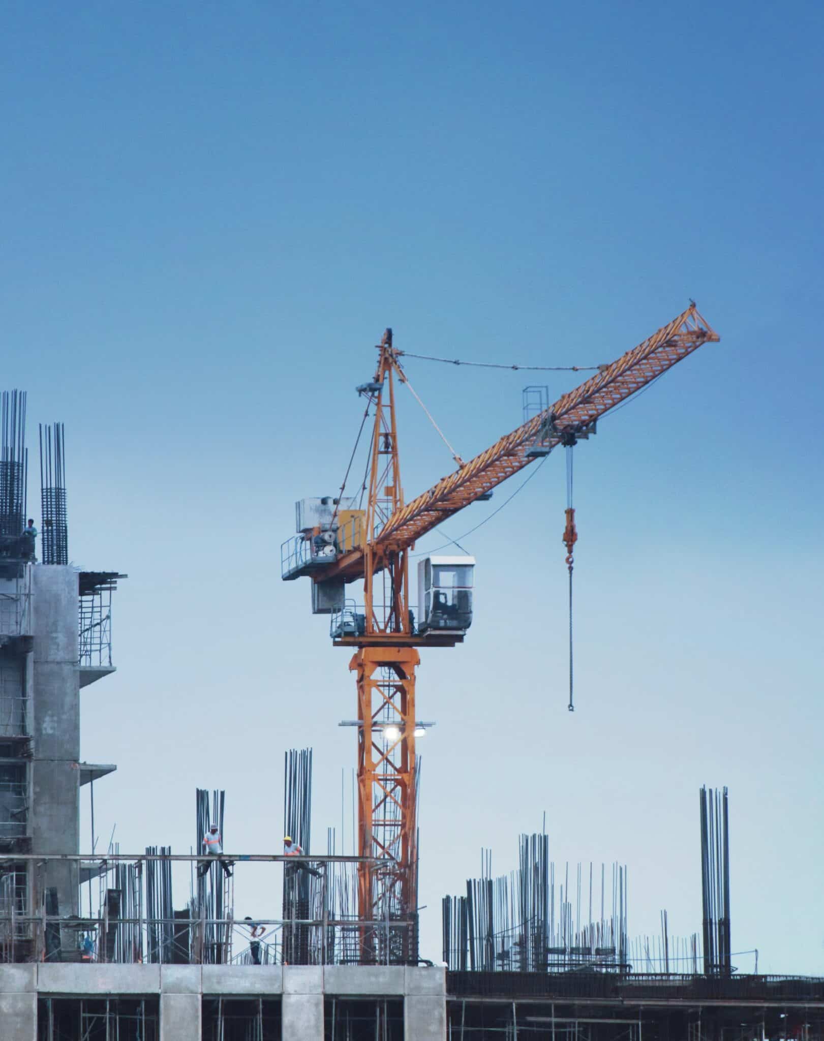 a crane that is on top of a building